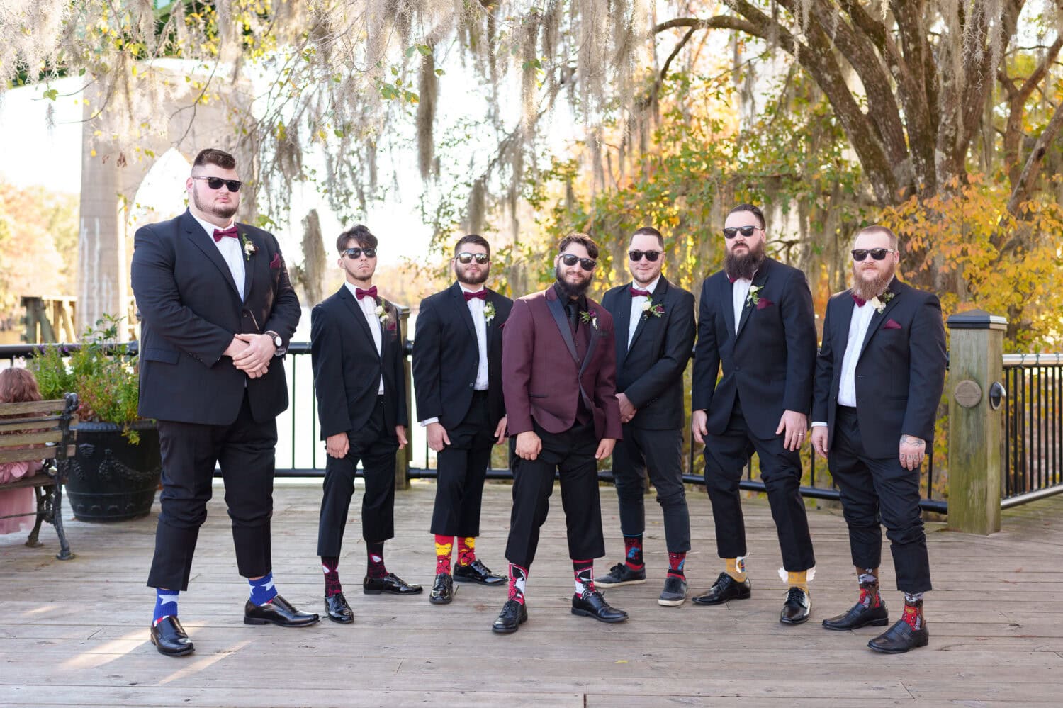 Groomsmen showing off their socks - The Cypress Inn - Conway, SC