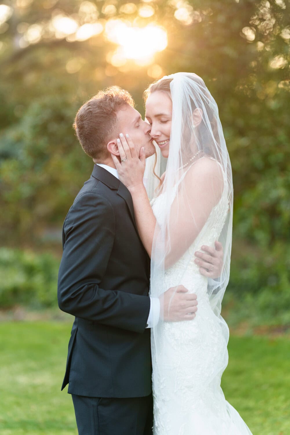 Kiss on the cheek in the sunset - Litchfield Country Club