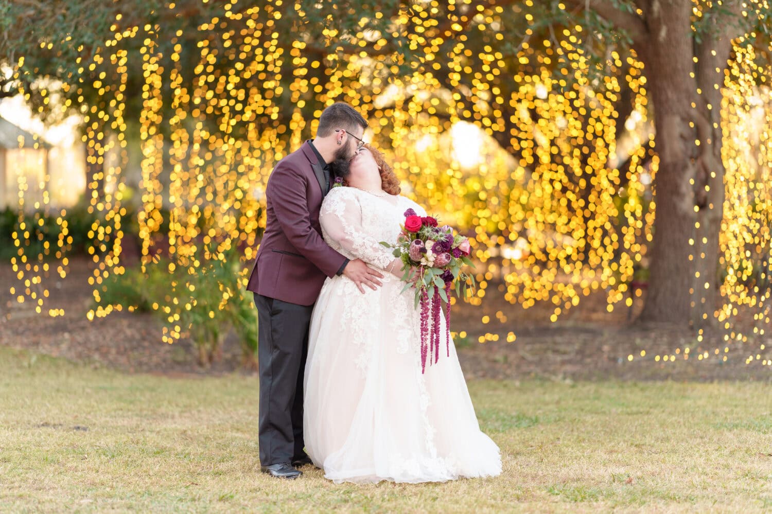 Kiss under the lights hanging from the trees - The Cypress Inn - Conway, SC