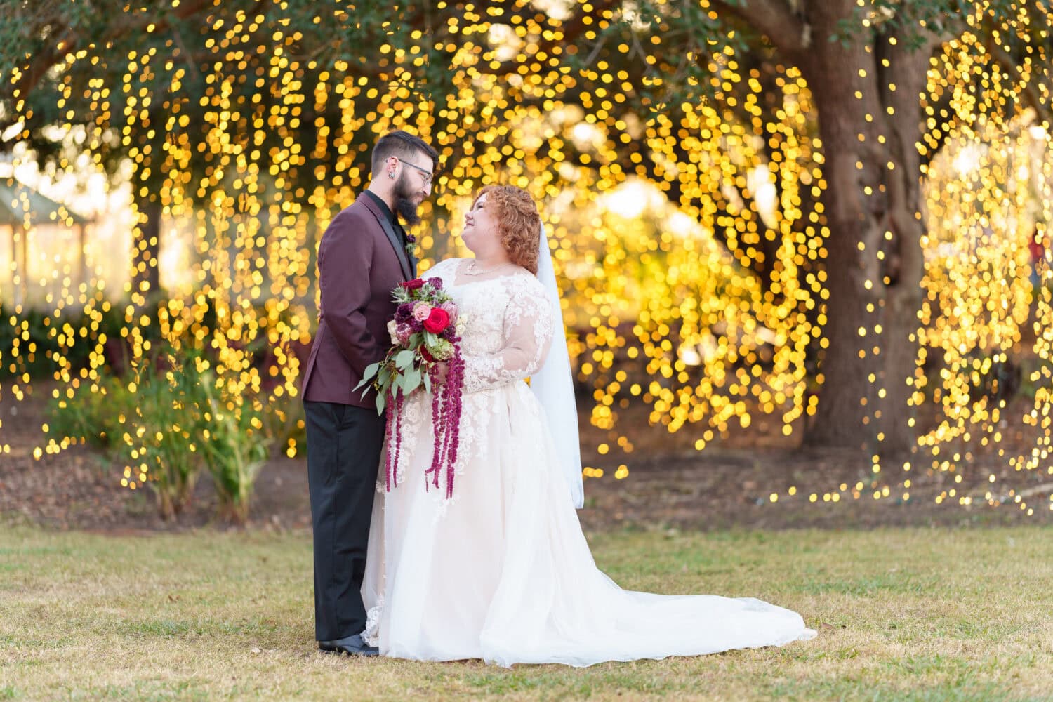 Portraits of bride and groom under the lights - The Cypress Inn - Conway, SC