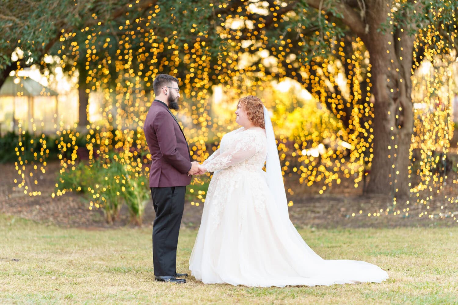 Portraits of bride and groom under the lights - The Cypress Inn - Conway, SC