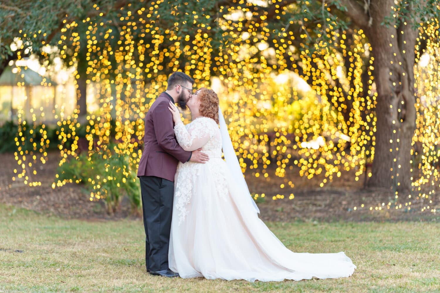 Portraits of bride and groom under the lights - The Cypress Inn - Conway, SC