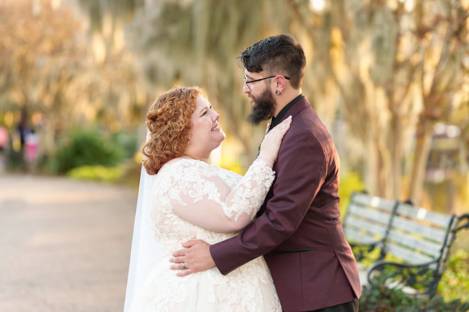 Portraits of the bride and groom under the moss covered path - The Cypress Inn - Conway, SC