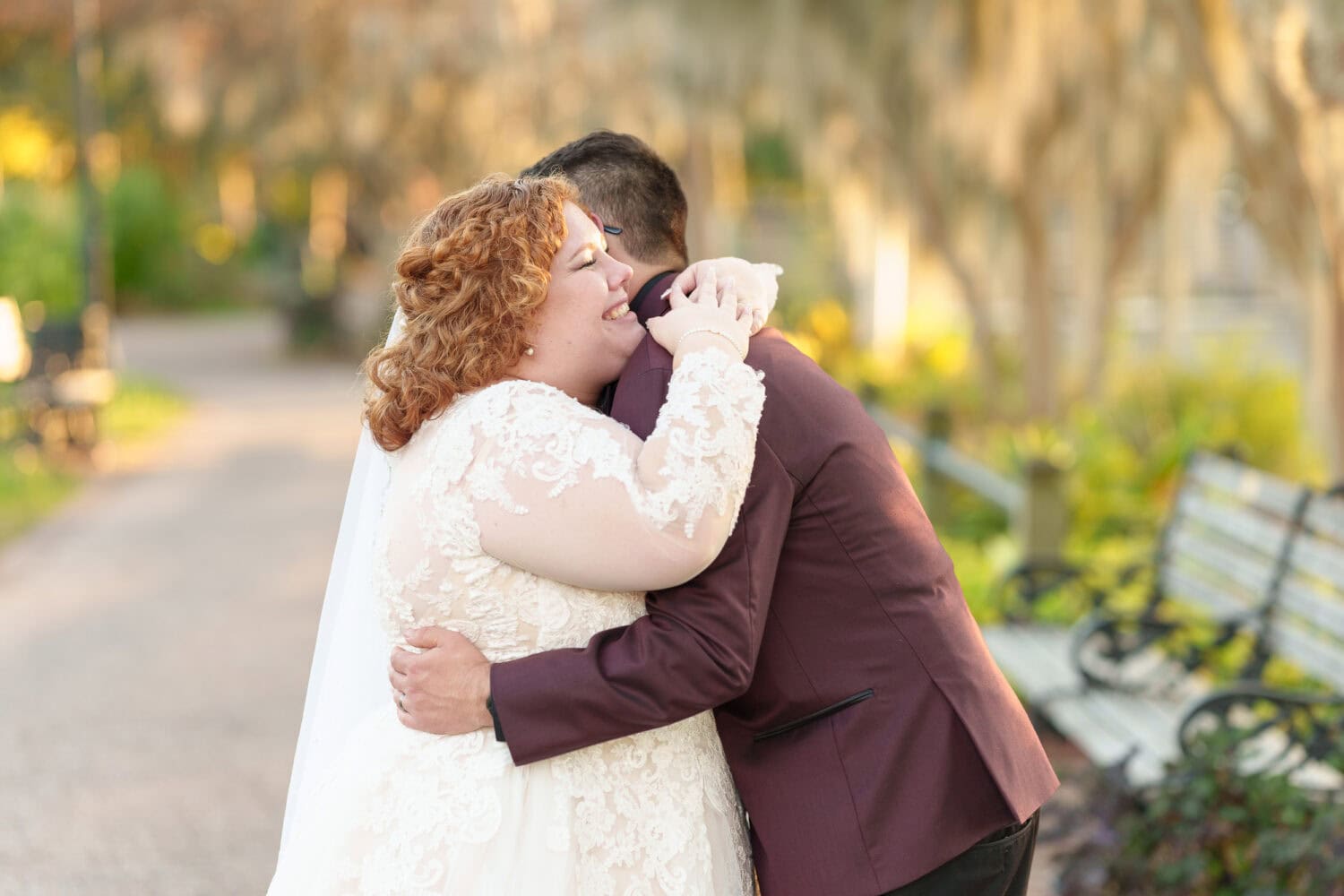 Portraits of the bride and groom under the moss covered path - The Cypress Inn - Conway, SC