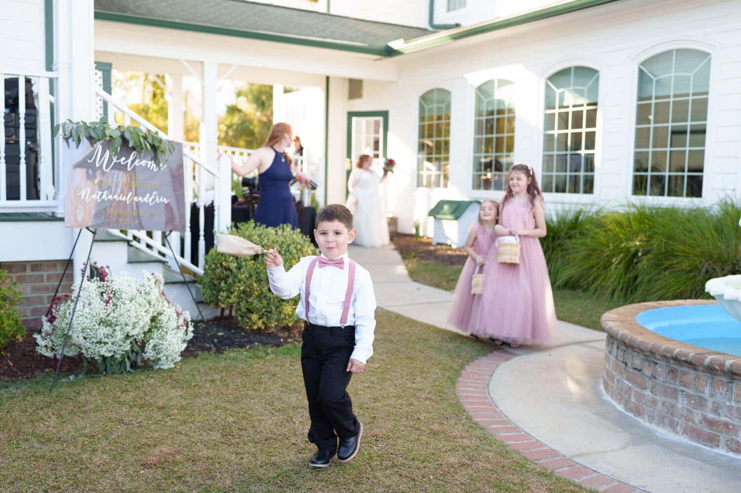 Ring bearer walking to ceremony - The Cypress Inn - Conway, SC