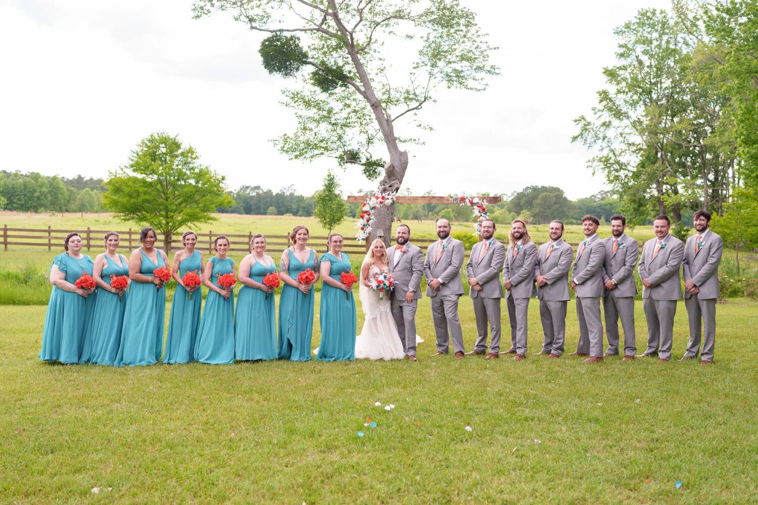 Big wedding party in front of the pasture - Wildhorse at Parker Farms