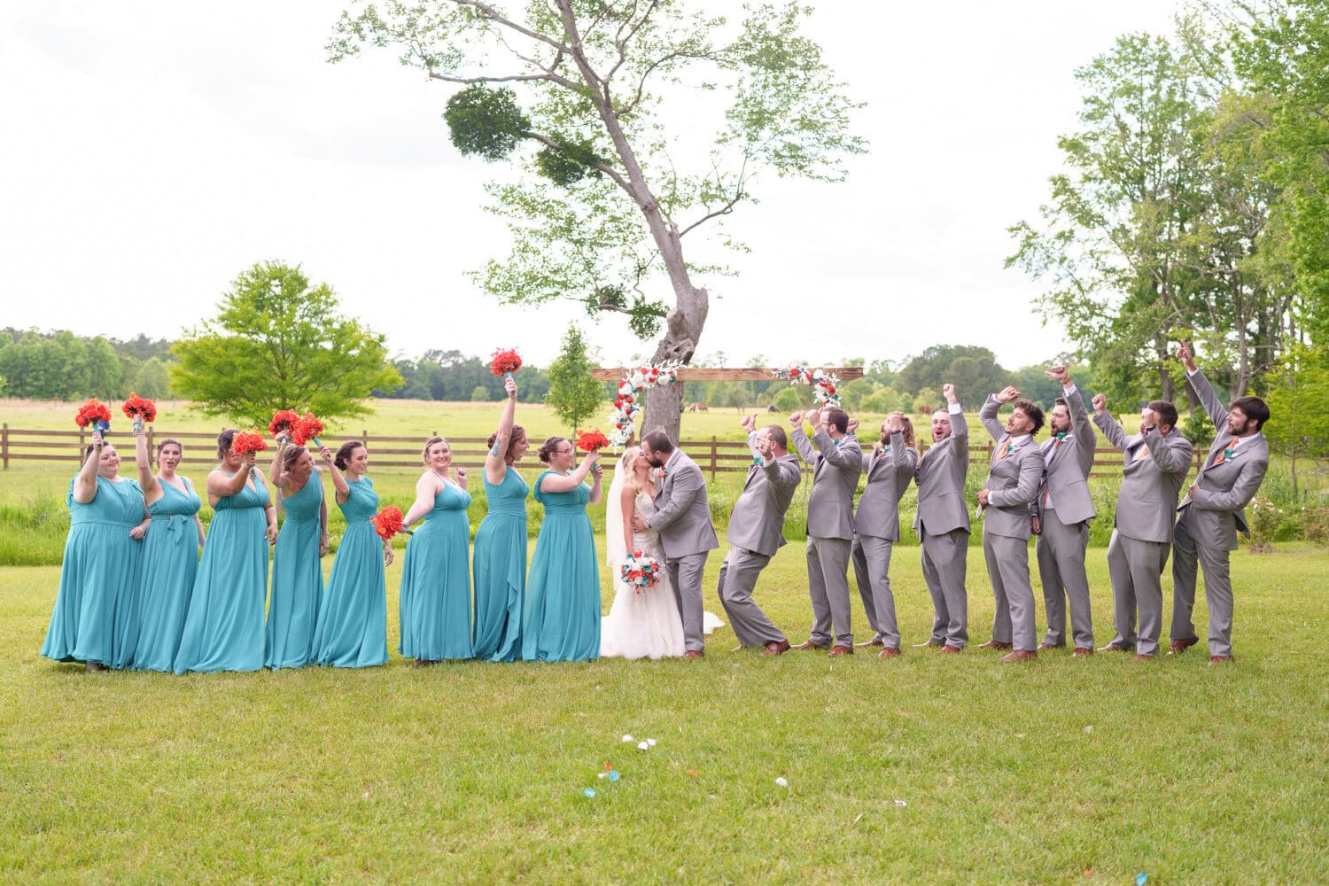 Big wedding party in front of the pasture - Wildhorse at Parker Farms