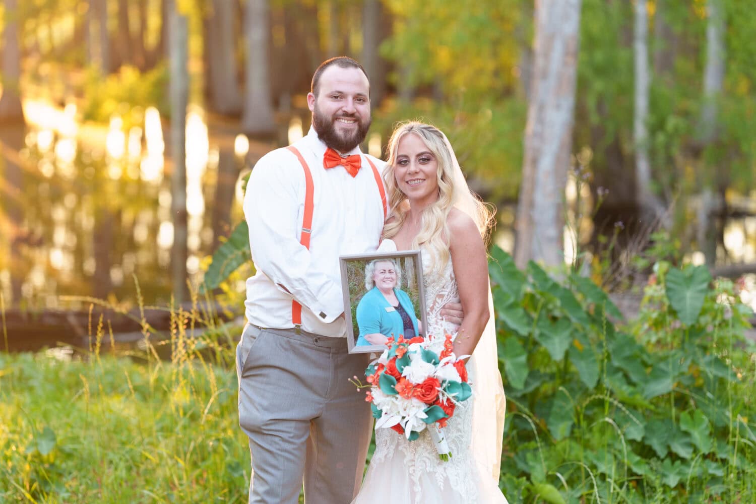 Bride holding pictures of her mother - Wildhorse at Parker Farms