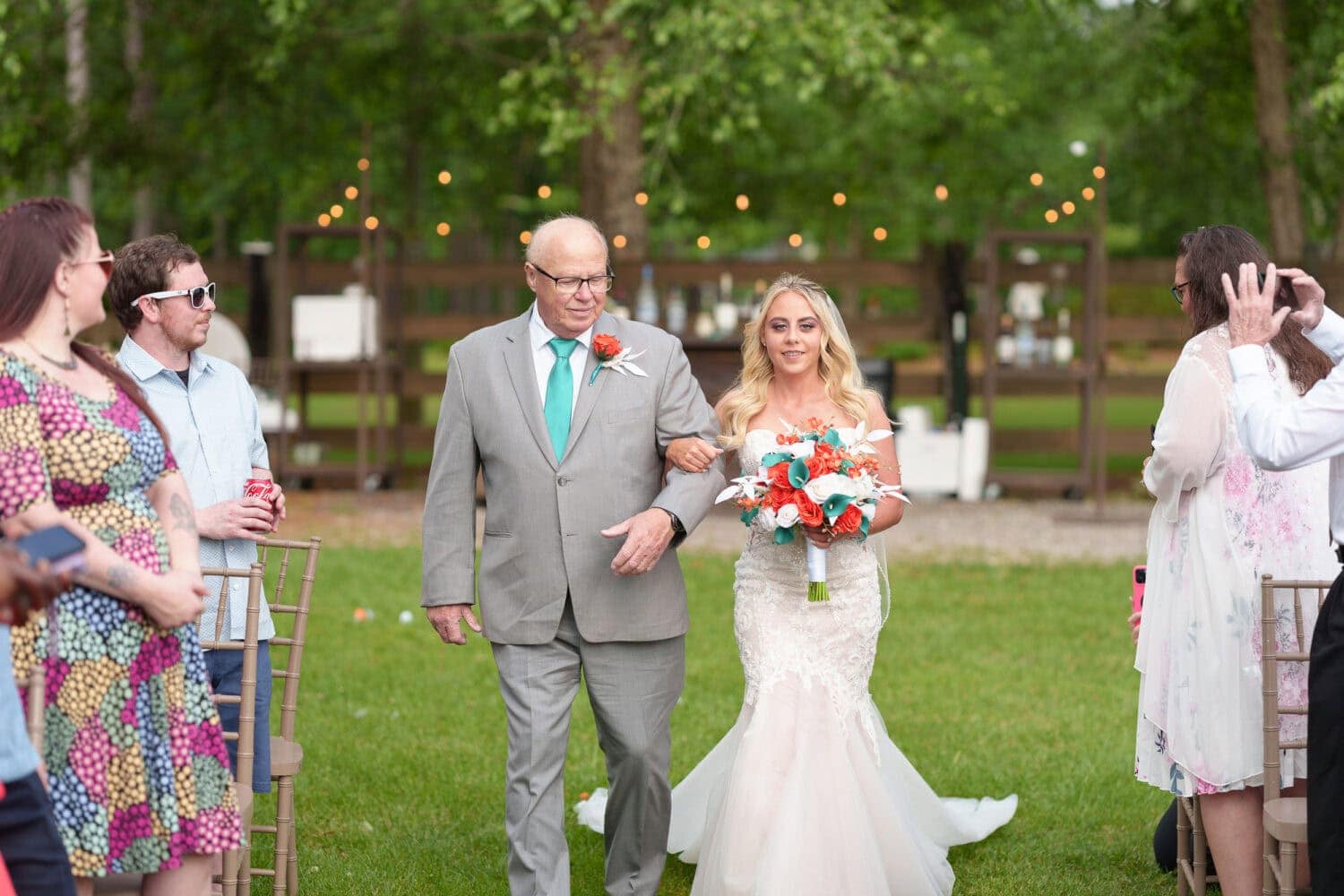 Bride walking down the aisle with her father - Wildhorse at Parker Farms