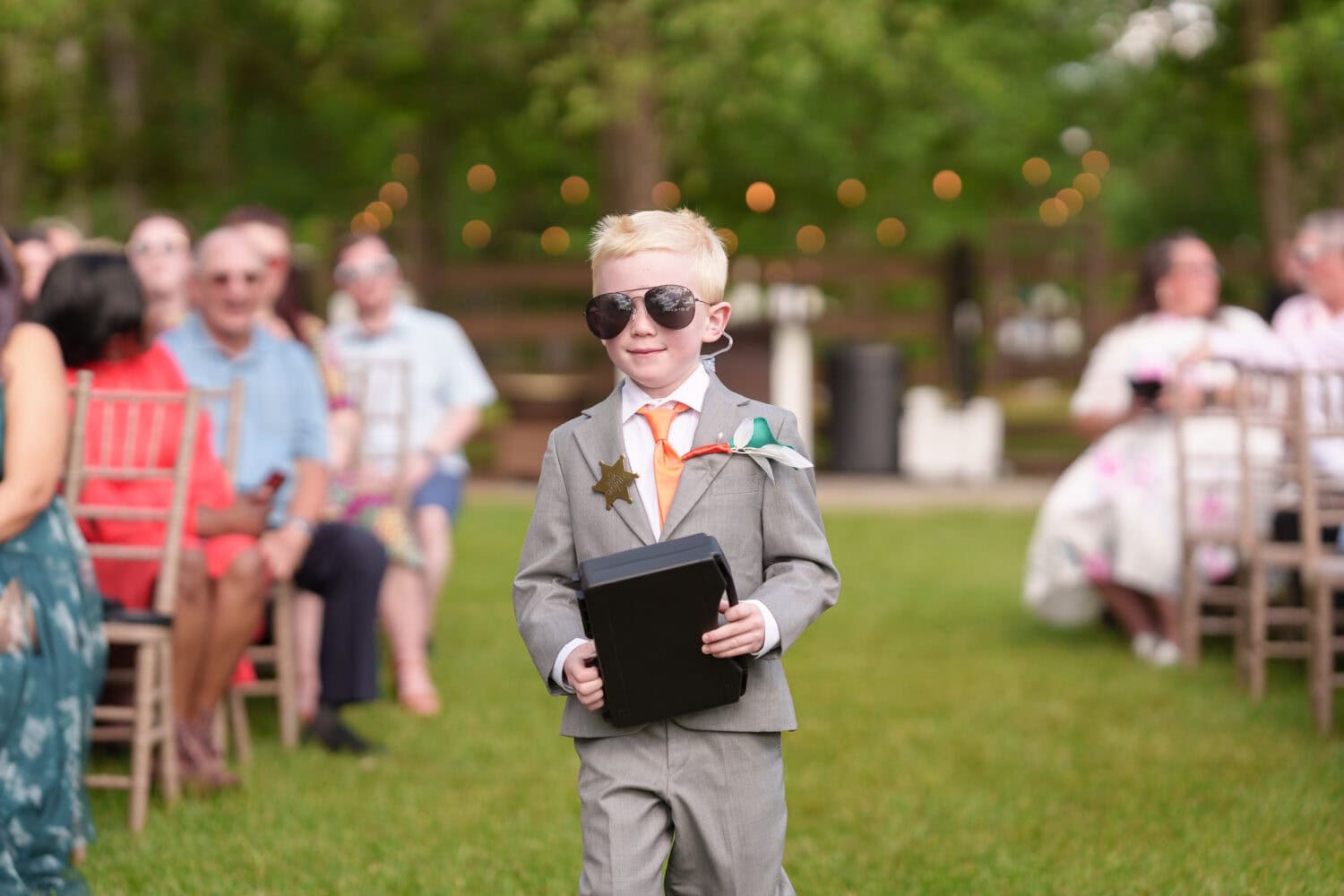 Ring bearer with security case and sunglasses - Wildhorse at Parker Farms